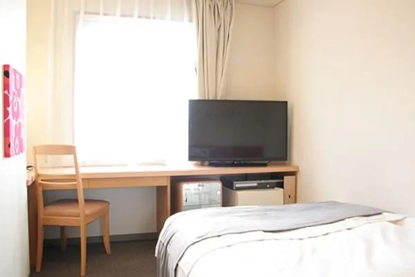 Bed in Hotel Estacion Hikone