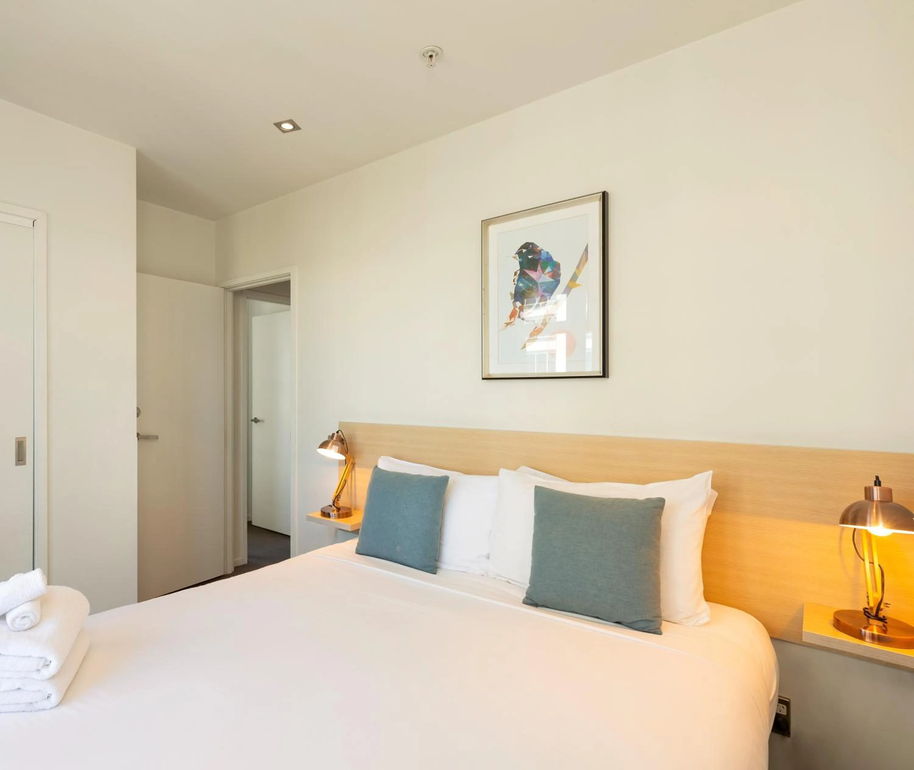 Bed in Auckland Harbour Suites
