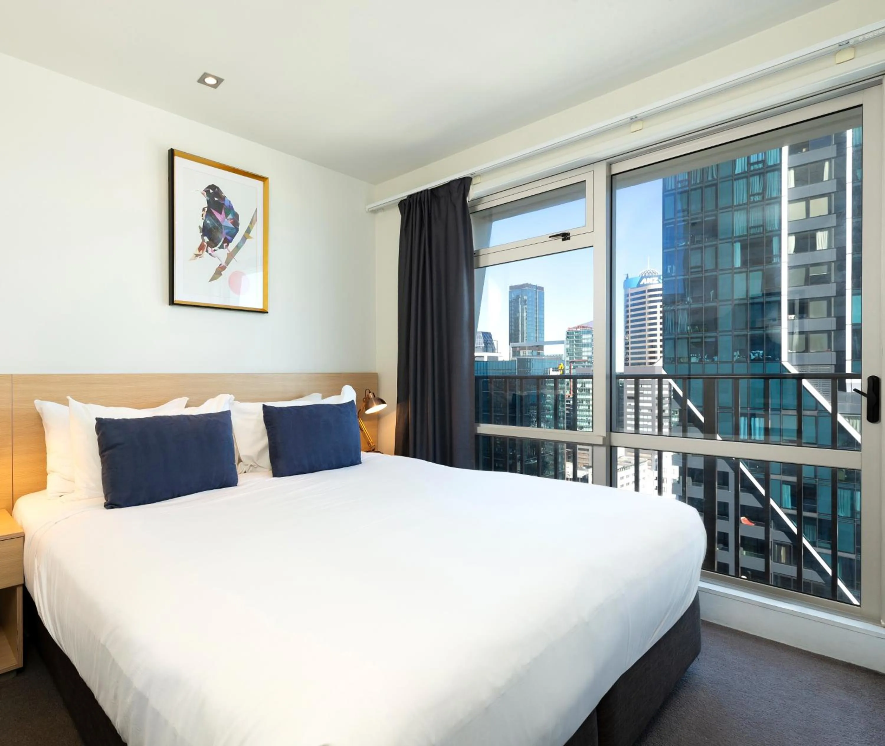 Bed in Auckland Harbour Suites