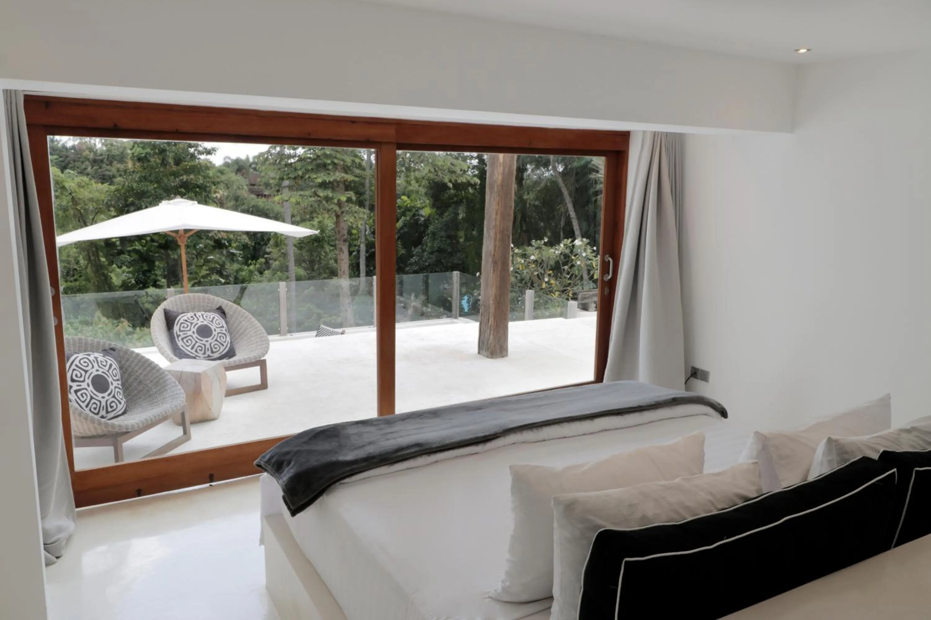 Patio, Bed in The Apartments Ubud