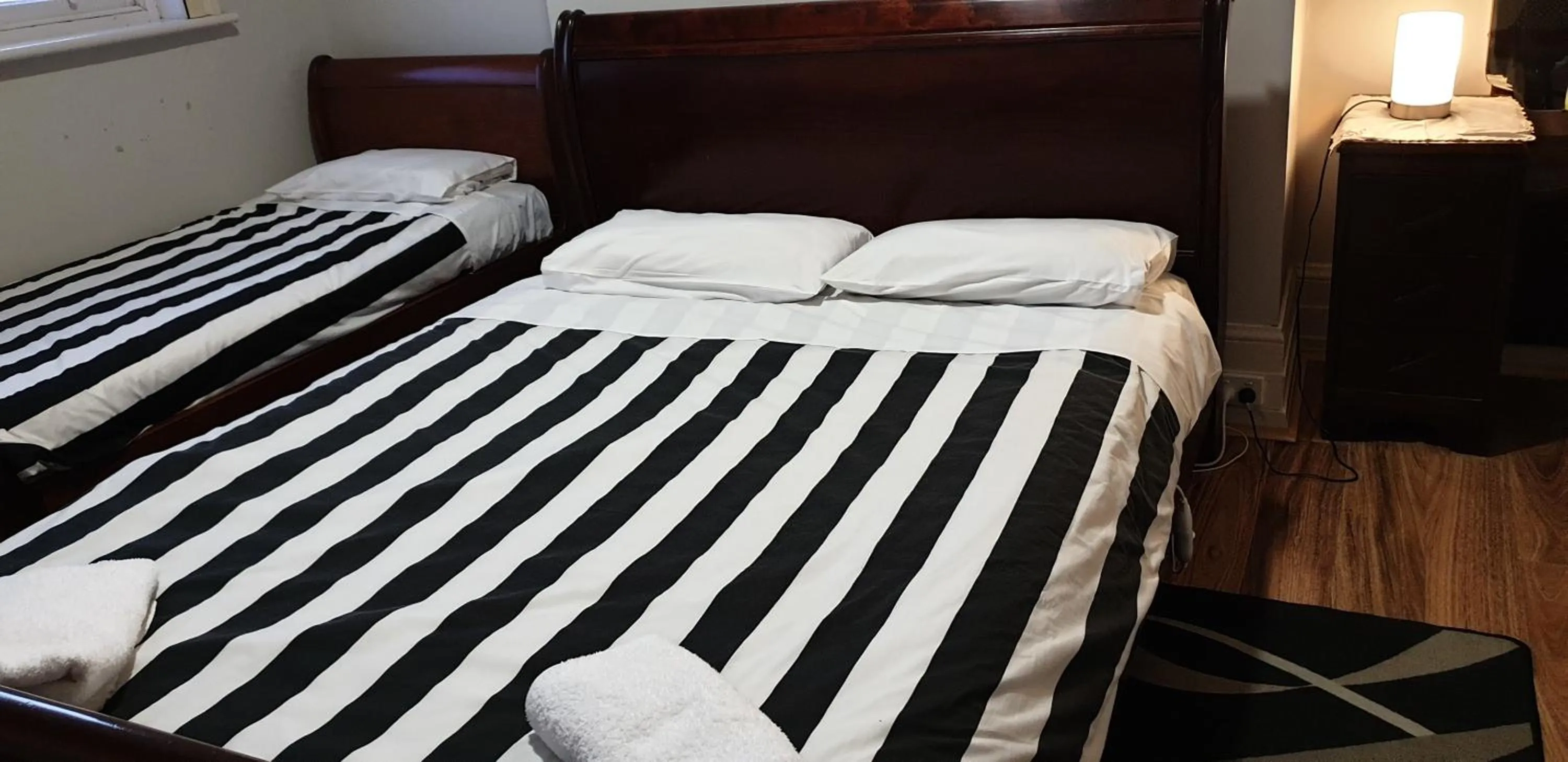 Bed in The Eastern Hotel Accommodation