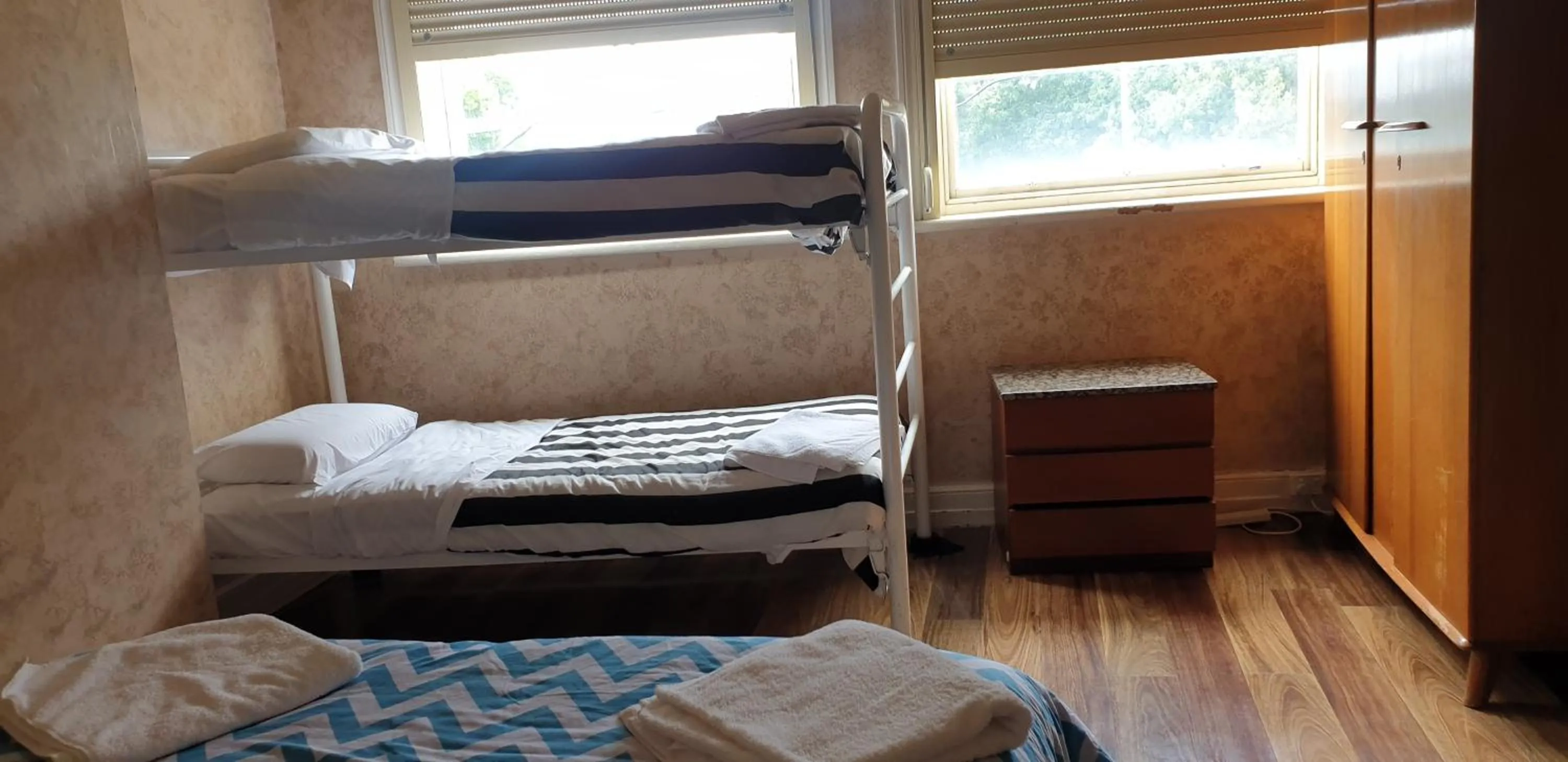 Bed in The Eastern Hotel Accommodation