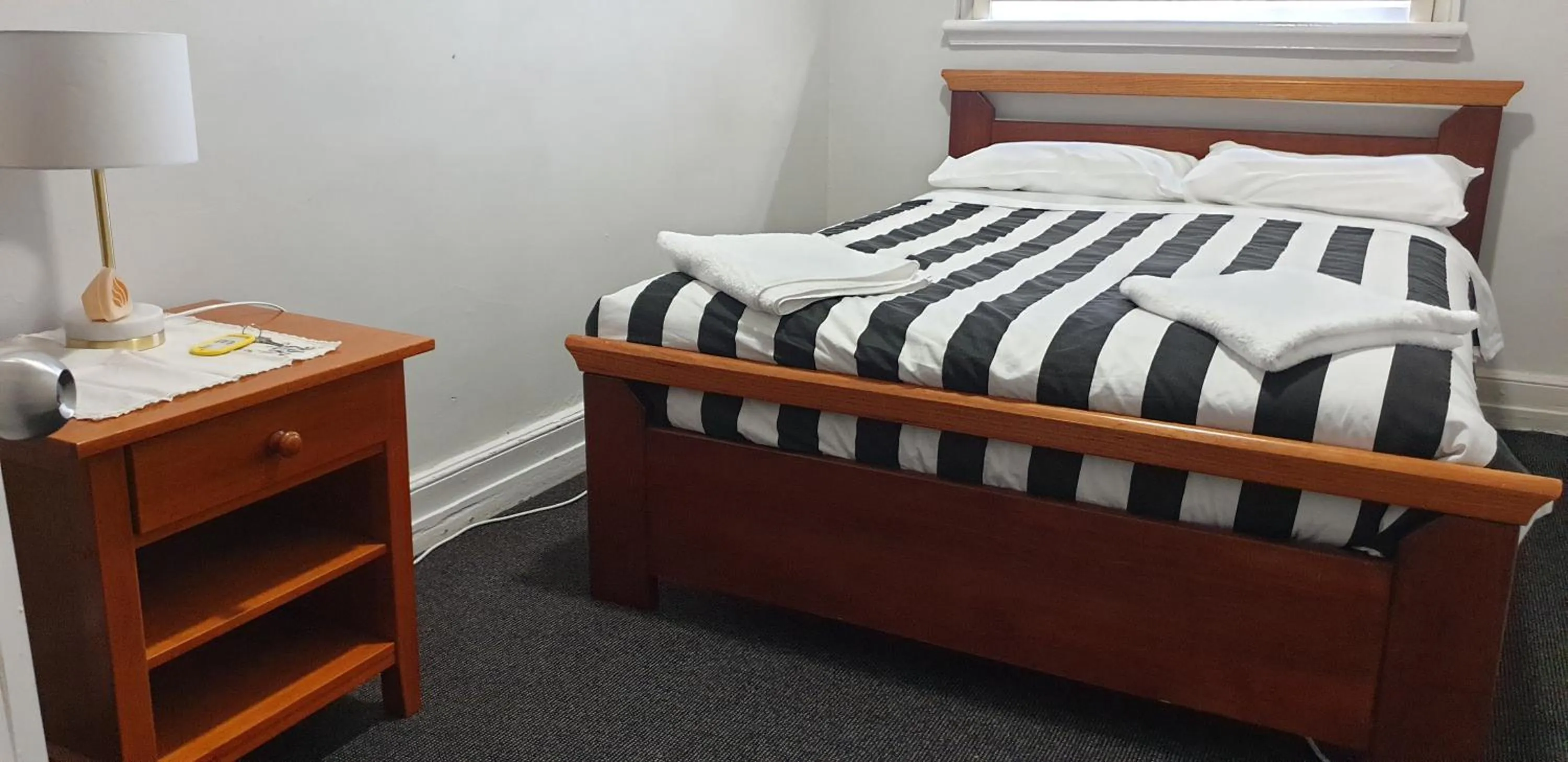 Bed in The Eastern Hotel Accommodation