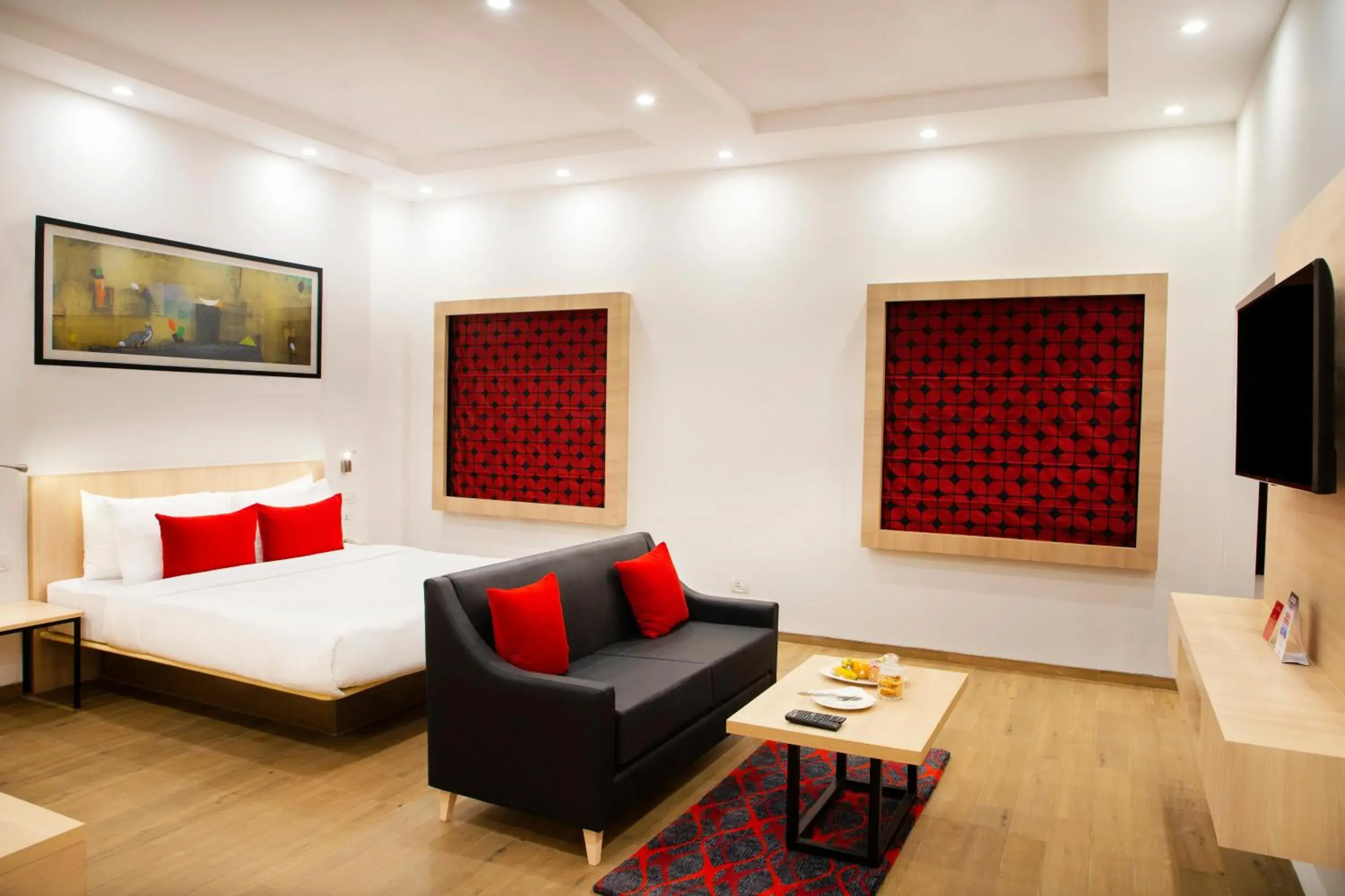 Seating area, Bed in Red Fox by Lemon Tree Hotels, Dehradun Seating area, Bed in Red Fox by Lemon Tree Hotels, Dehradun