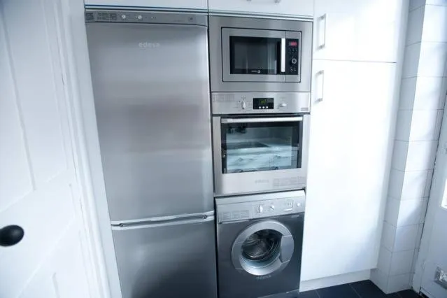 Kitchen or kitchenette in Apartamentos Calle Rosario