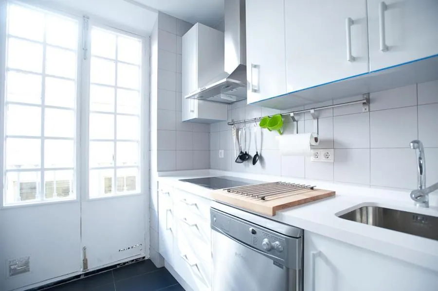 Kitchen or kitchenette in Apartamentos Calle Rosario