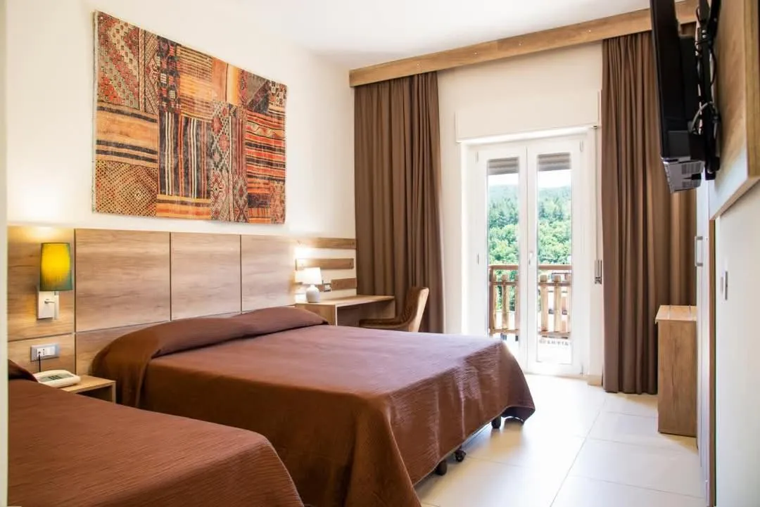 Bed in Hotel Meranda