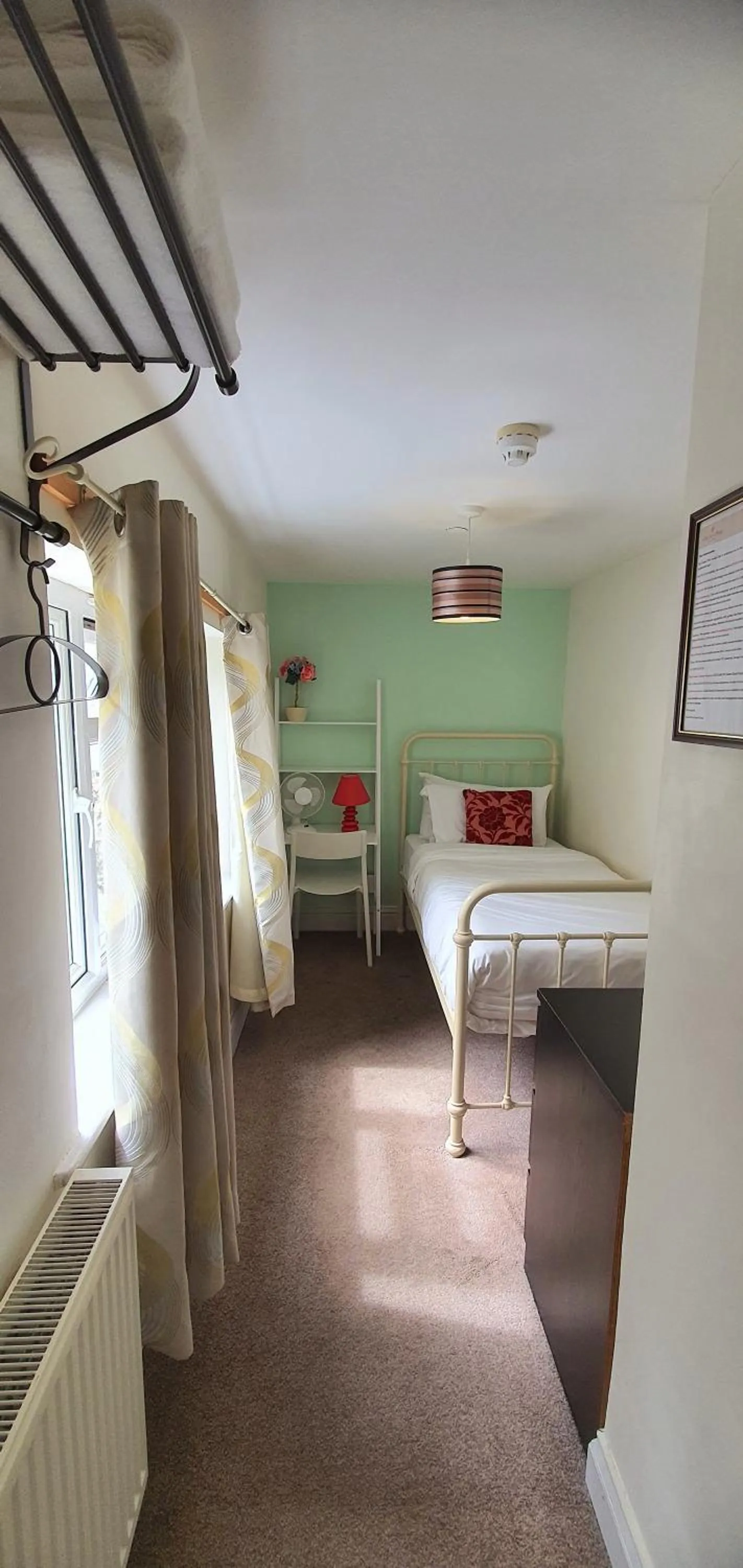 Bed in Grand Pier Guest House