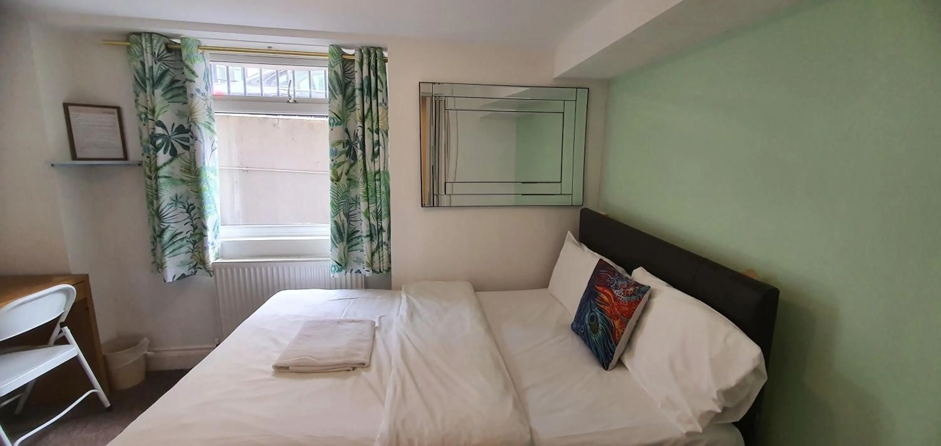 Bed in Grand Pier Guest House