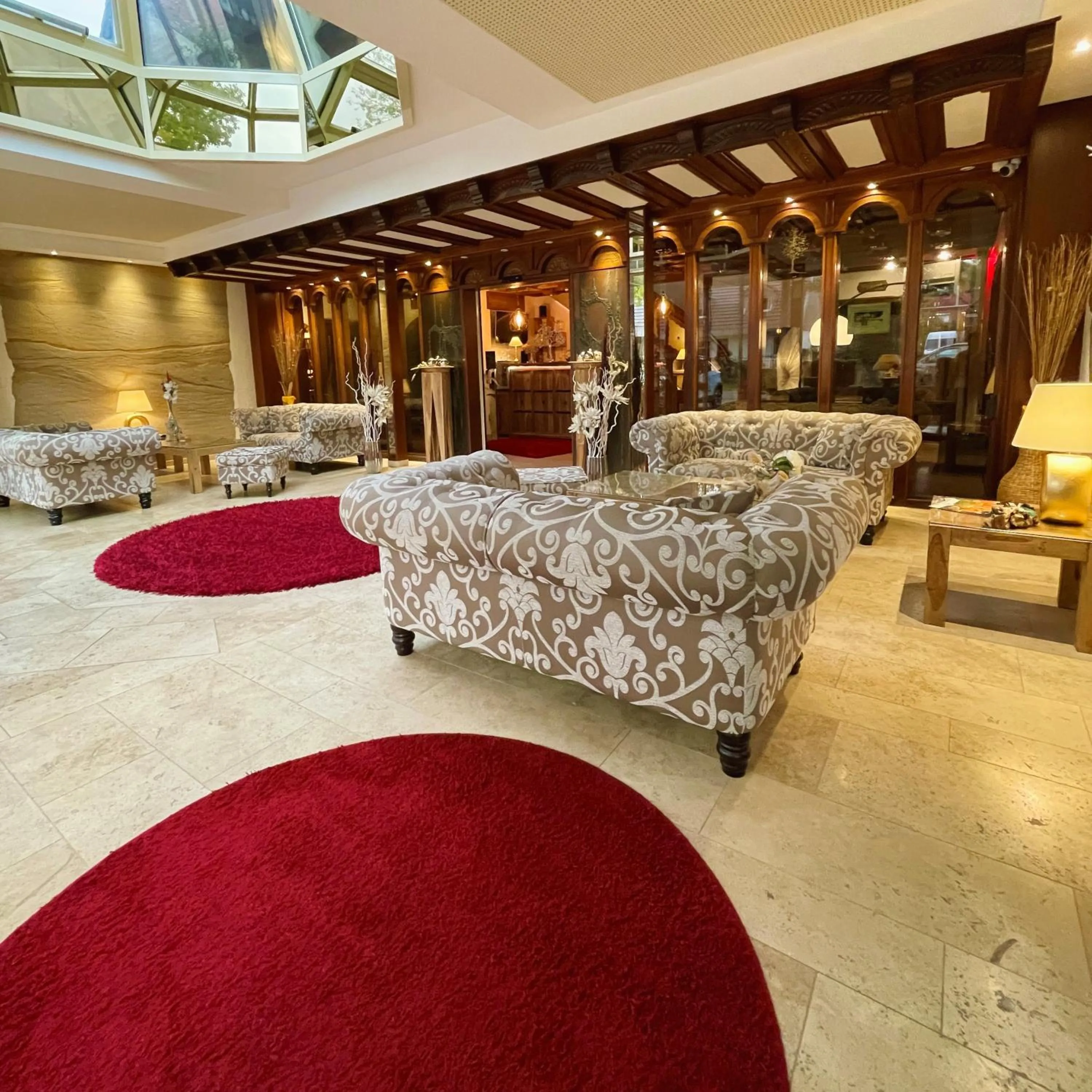 Communal lounge/ TV room in Villa am Park