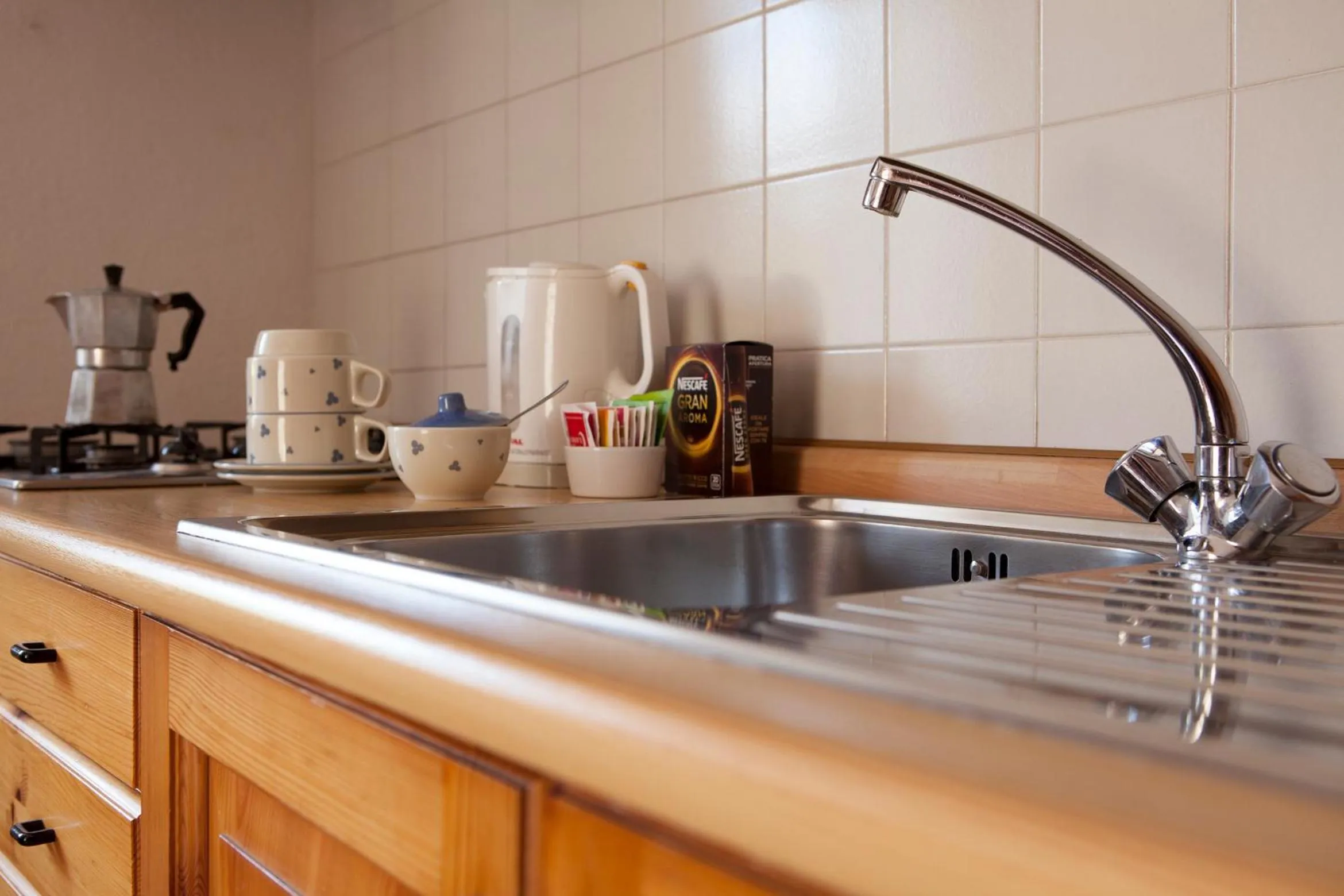 Kitchen or kitchenette in Le Rosier B&B e Appartamento