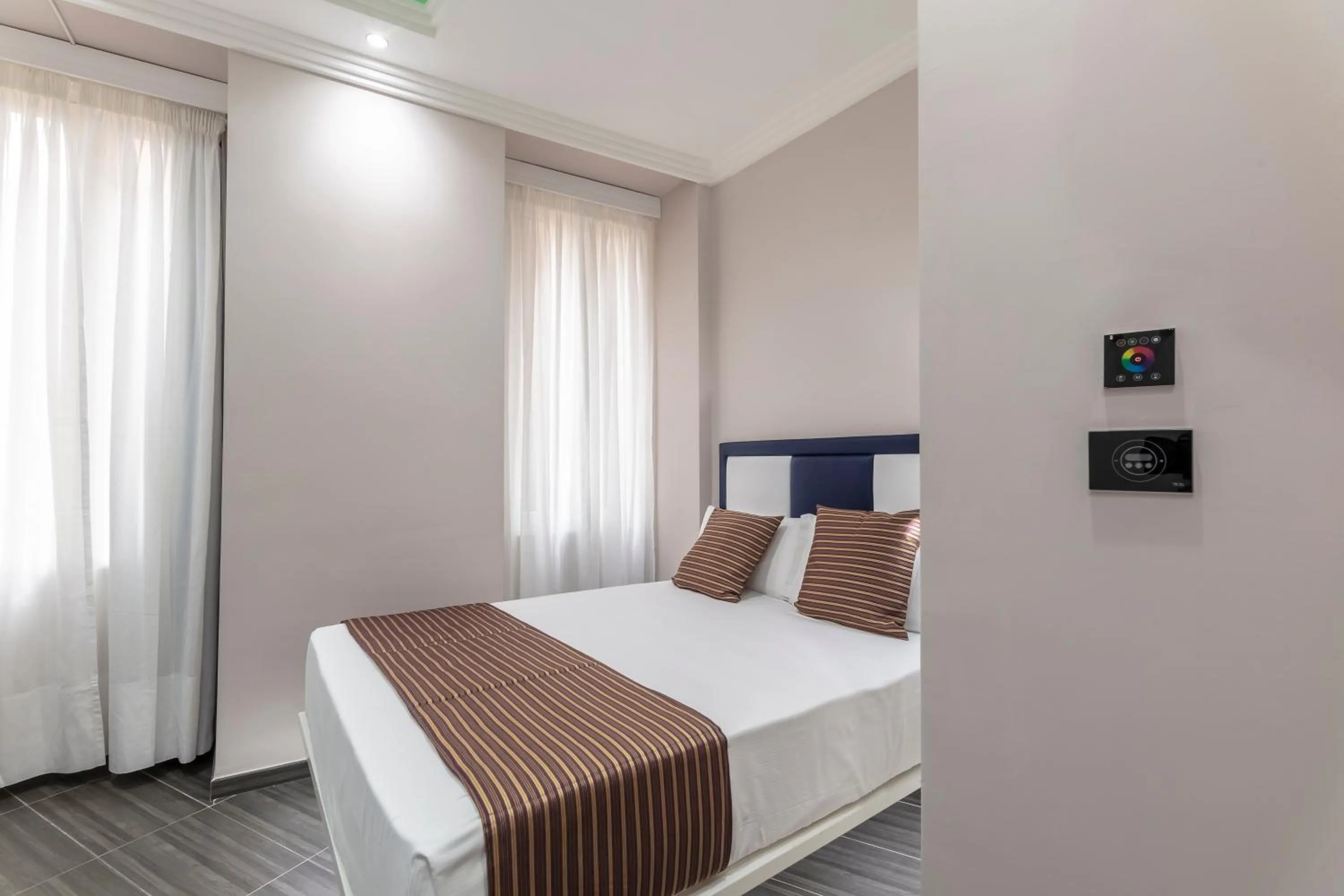 Decorative detail, Bed in THE ONE Boutique Hotel & SPA Rome