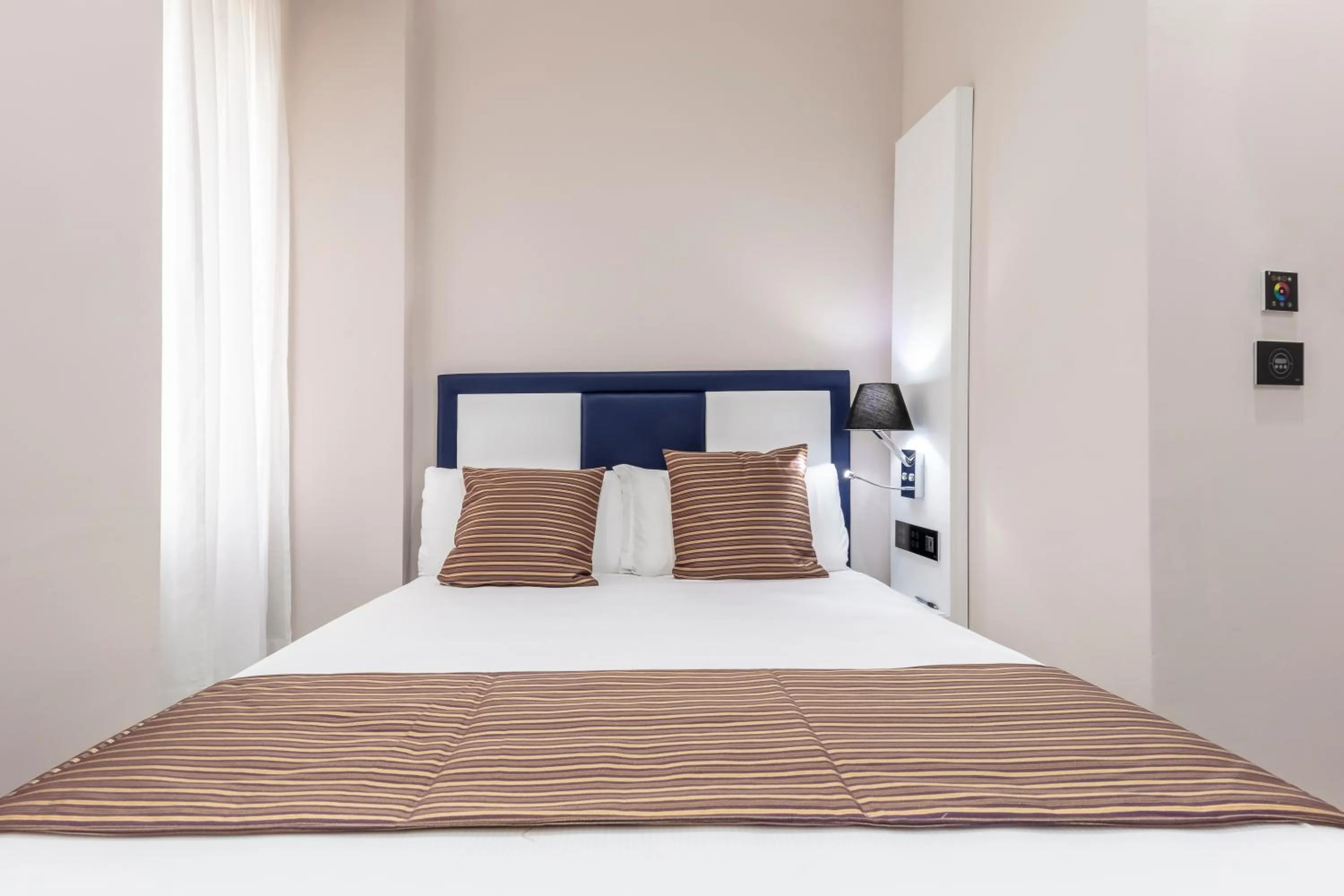 Decorative detail, Bed in THE ONE Boutique Hotel & SPA Rome