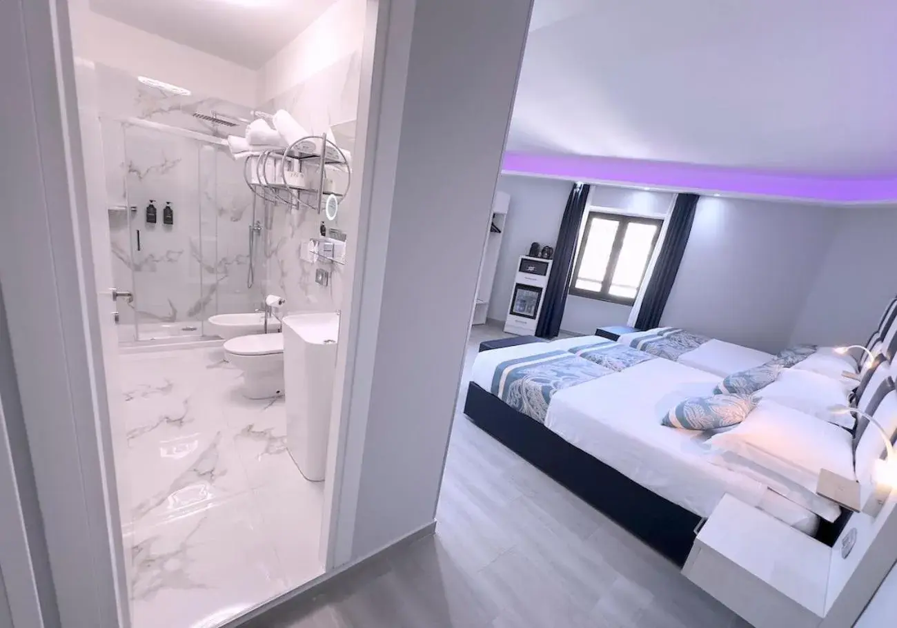Luxury Quadruple Room in THE ONE Boutique Hotel & SPA Roma Luxury Quadruple Room in THE ONE Boutique Hotel & SPA Roma