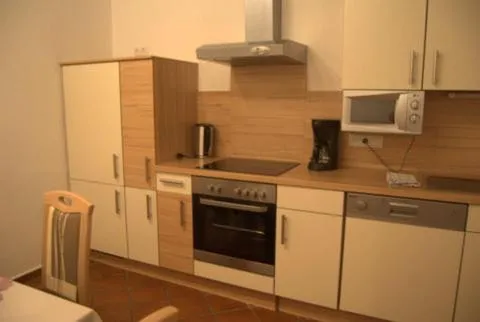 Kitchen or kitchenette in Ferienwohnung Mondial