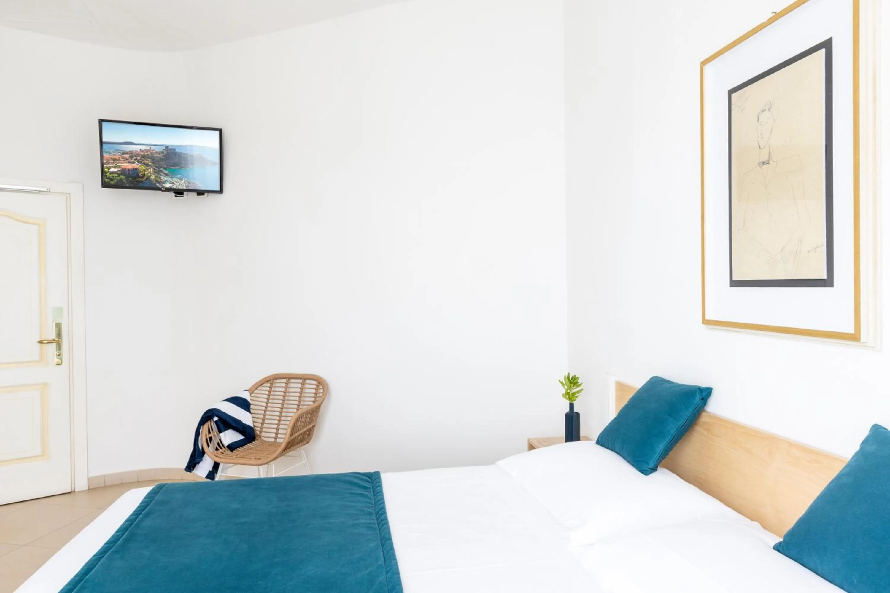 Photo of the whole room in Hotel Capo D'Uomo