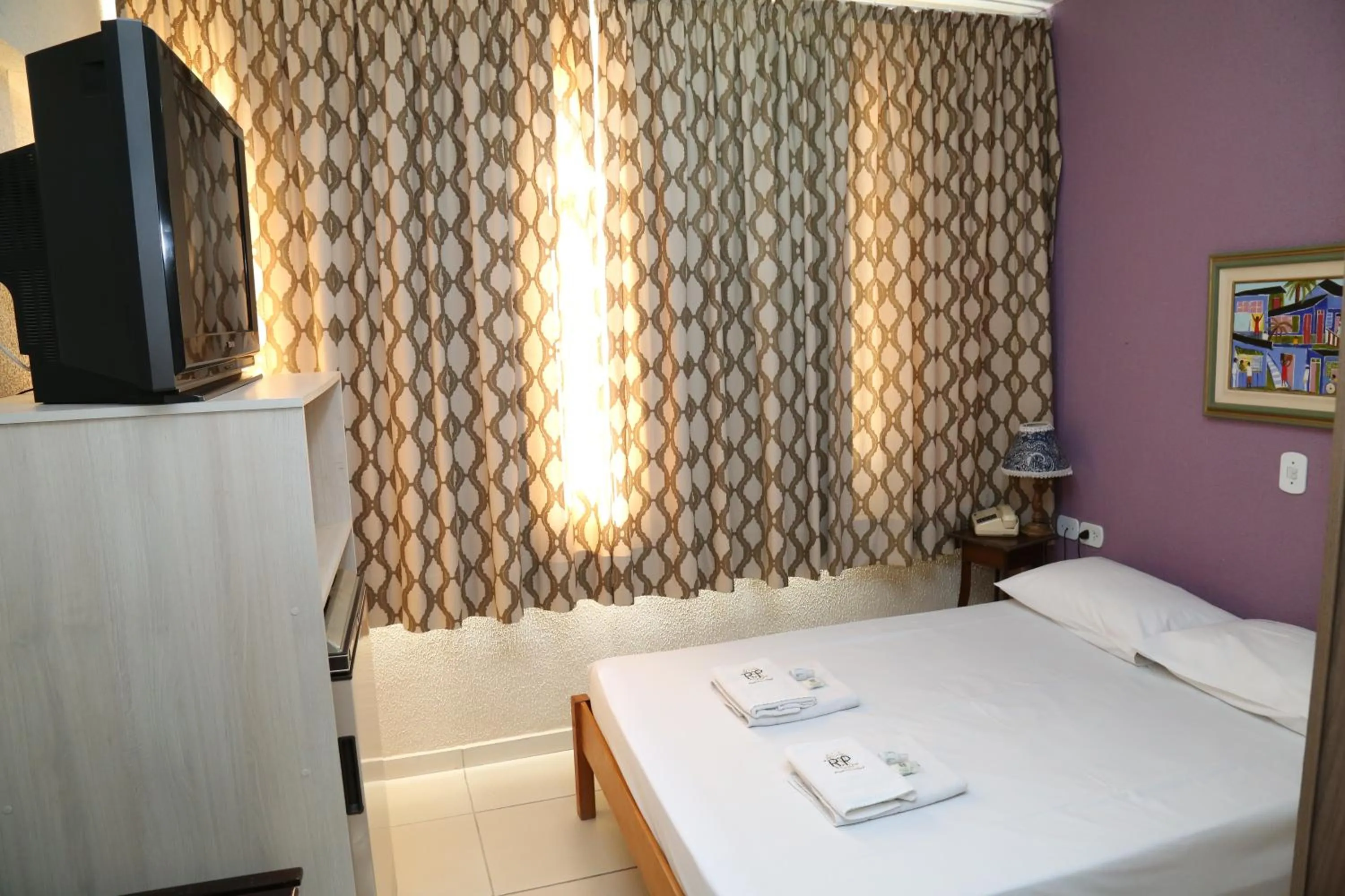 Bed in CHA Royal Plaza Hotel