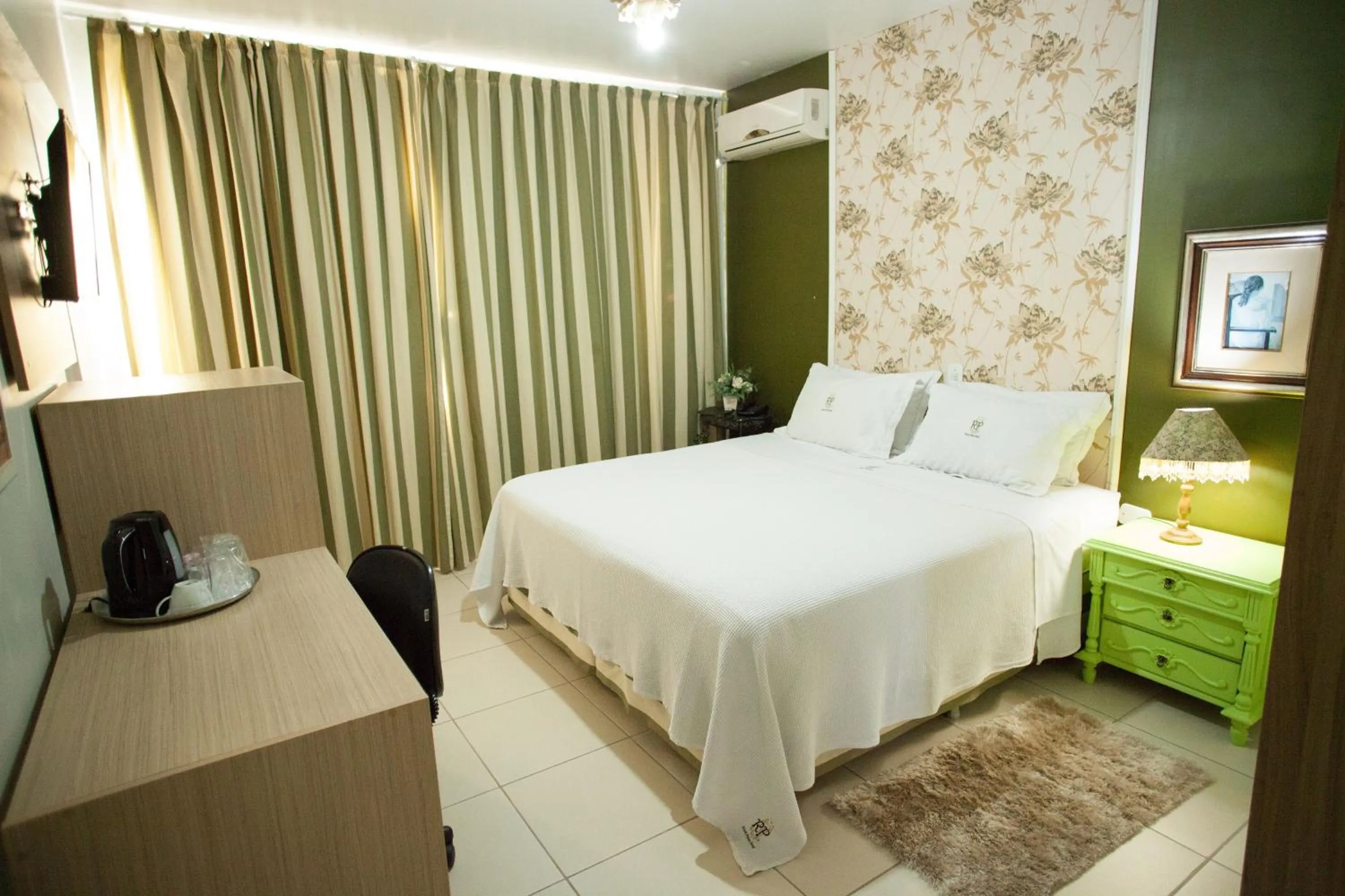 Bed in CHA Royal Plaza Hotel