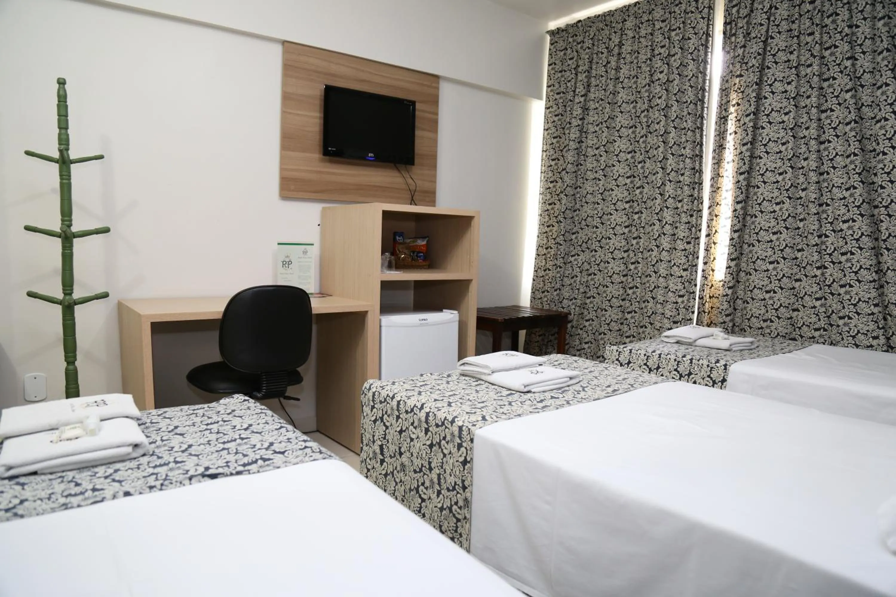 Bed in CHA Royal Plaza Hotel