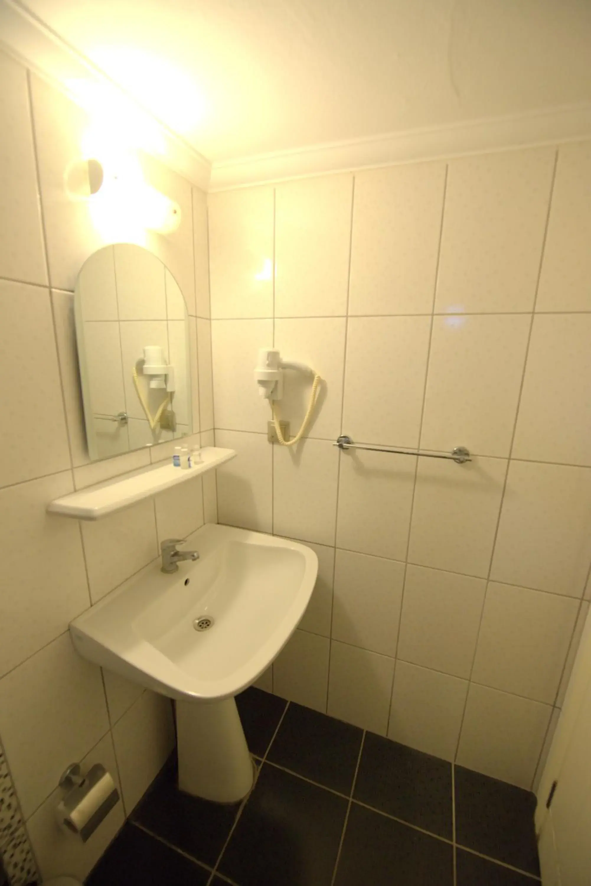 Bathroom in Delfi Hotel Spa & Wellness Center Bathroom in Delfi Hotel Spa & Wellness Center