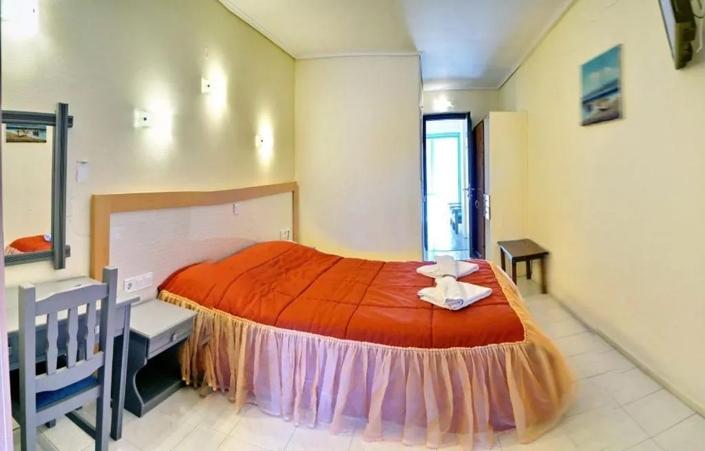 Bed in Theofilos Classic Hotel