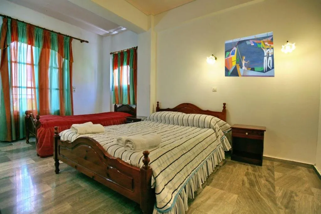 Bed in Theofilos Classic Hotel