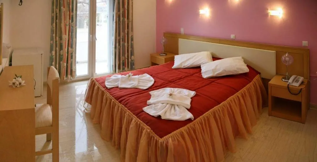 Bed in Theofilos Classic Hotel