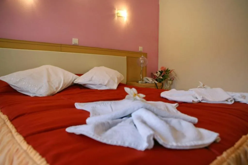 Bed in Theofilos Classic Hotel