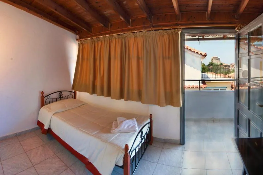 Bed in Theofilos Classic Hotel