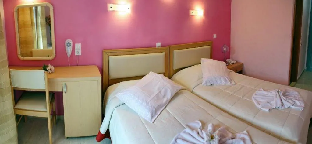 Bed in Theofilos Classic Hotel