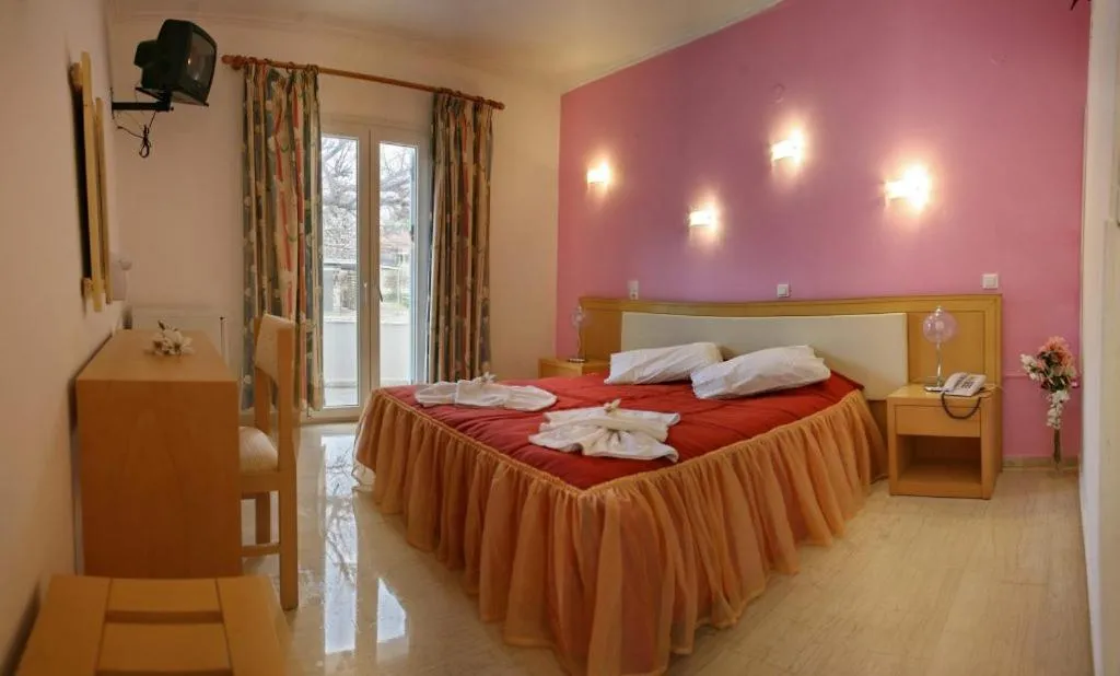 Bed in Theofilos Classic Hotel