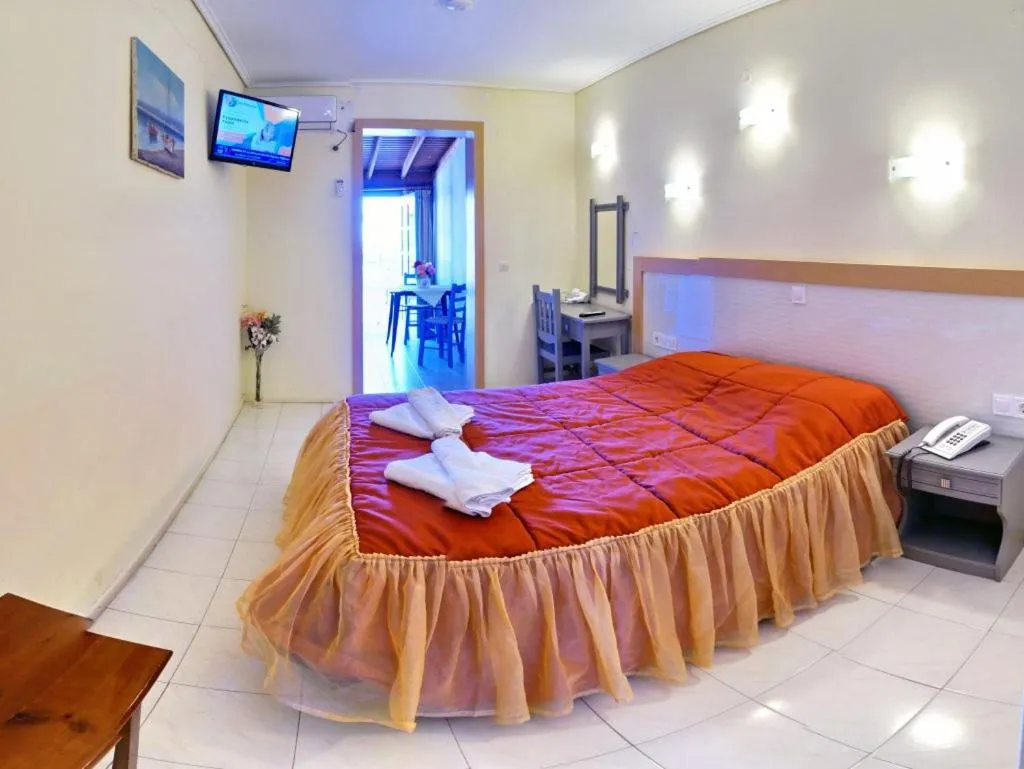 Bed in Theofilos Classic Hotel