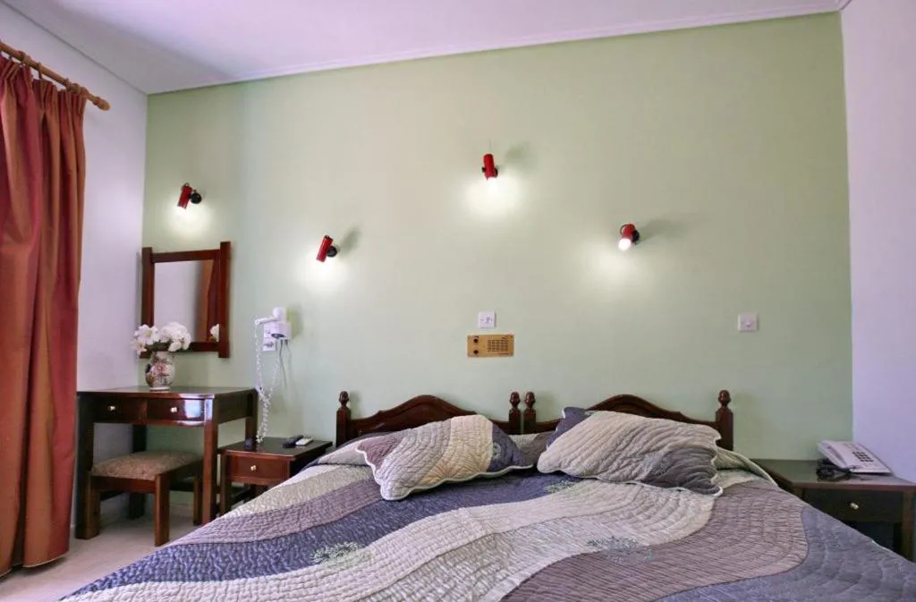 Bed in Theofilos Classic Hotel