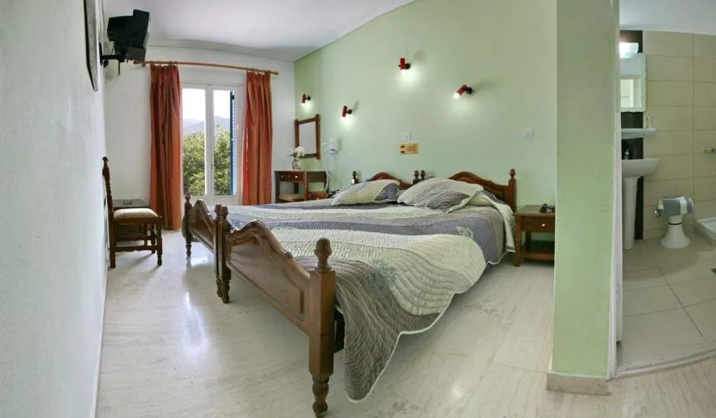 Bed in Theofilos Classic Hotel