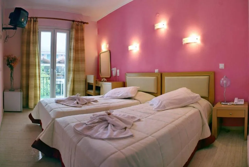 Bed in Theofilos Classic Hotel
