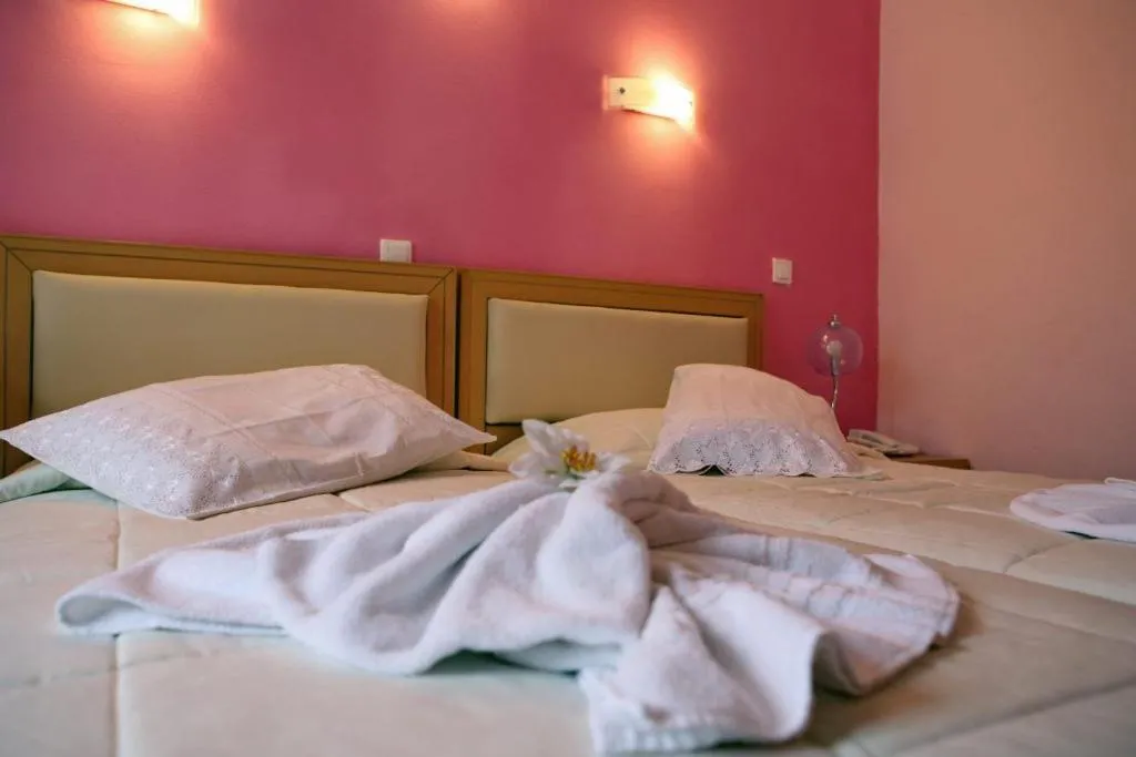Bed in Theofilos Classic Hotel