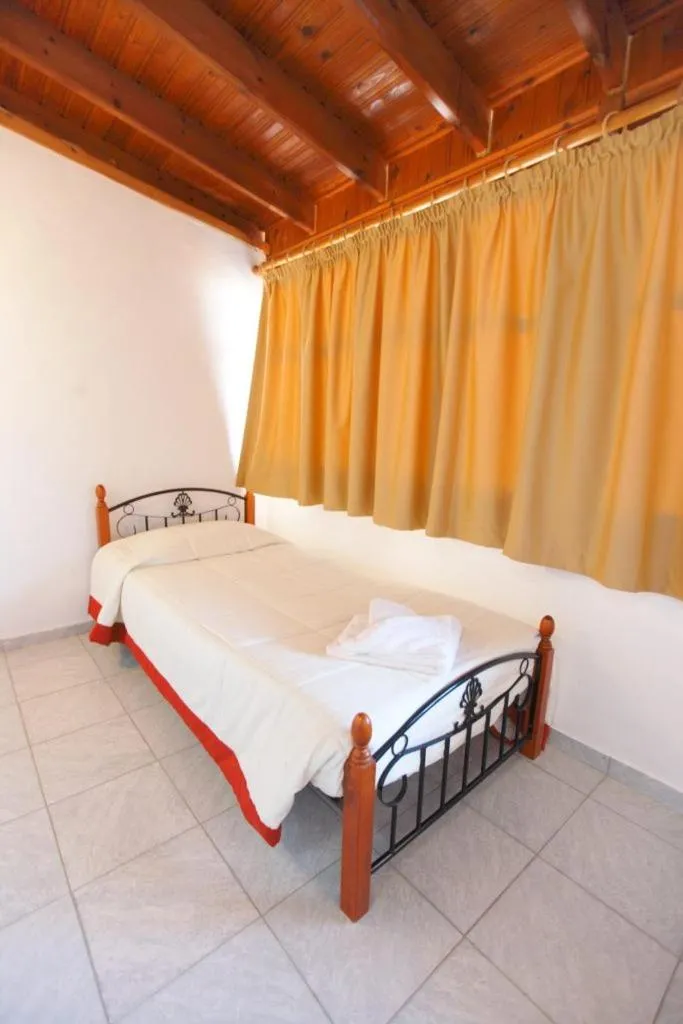 Bed in Theofilos Classic Hotel
