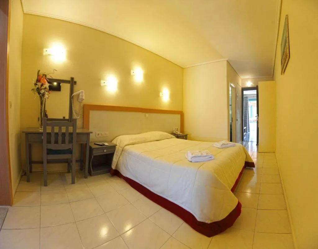 Bed in Theofilos Classic Hotel