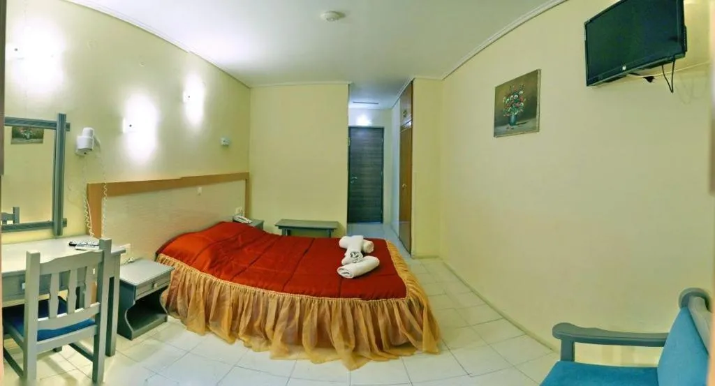 Bed in Theofilos Classic Hotel