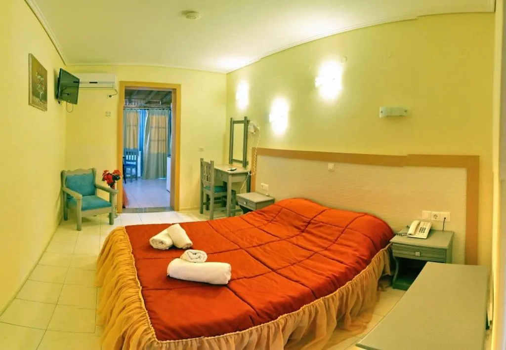 Bed in Theofilos Classic Hotel