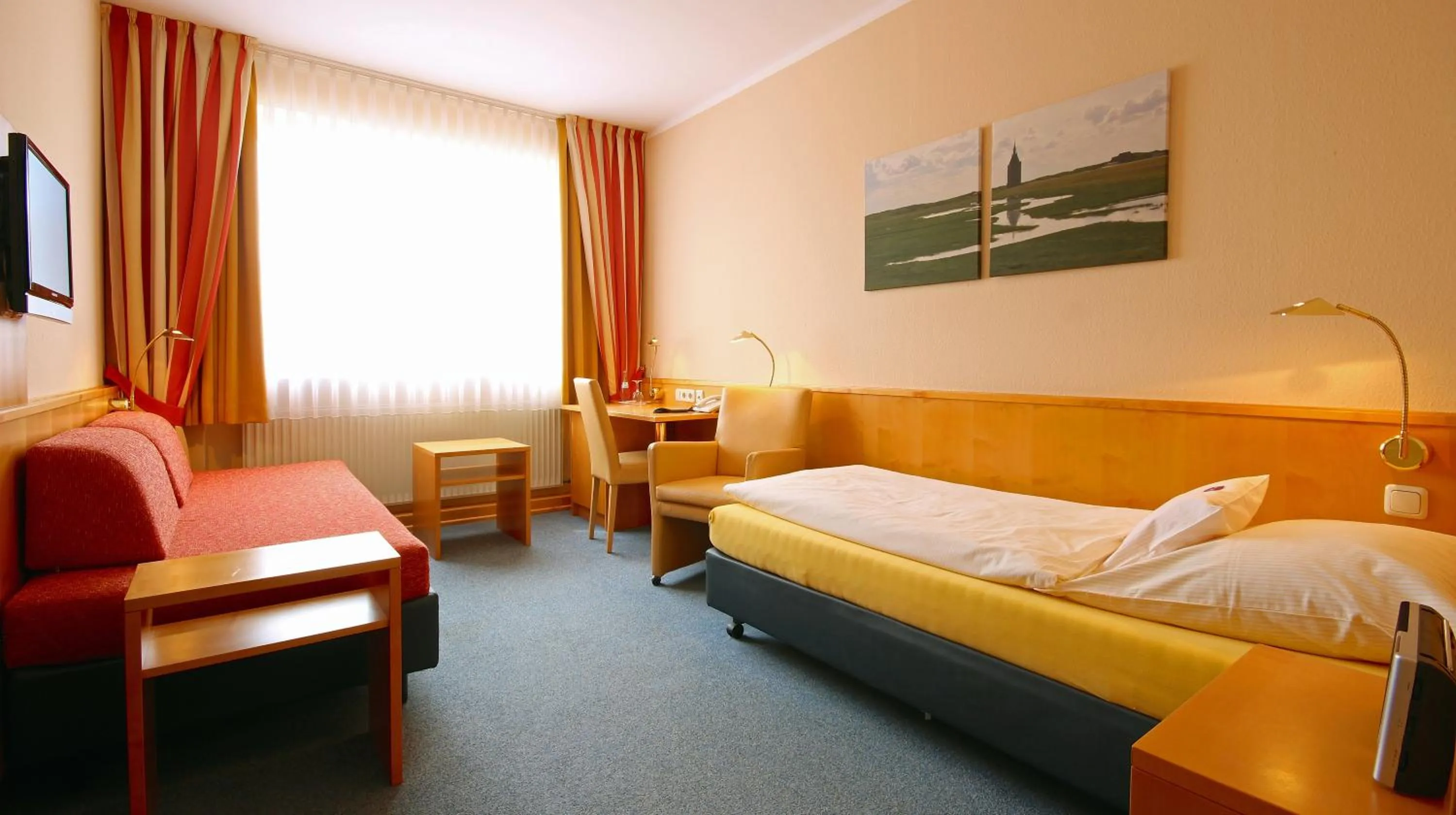 Bed in Hotel Hanken GmbH, Hotel Hanken und Seehotel