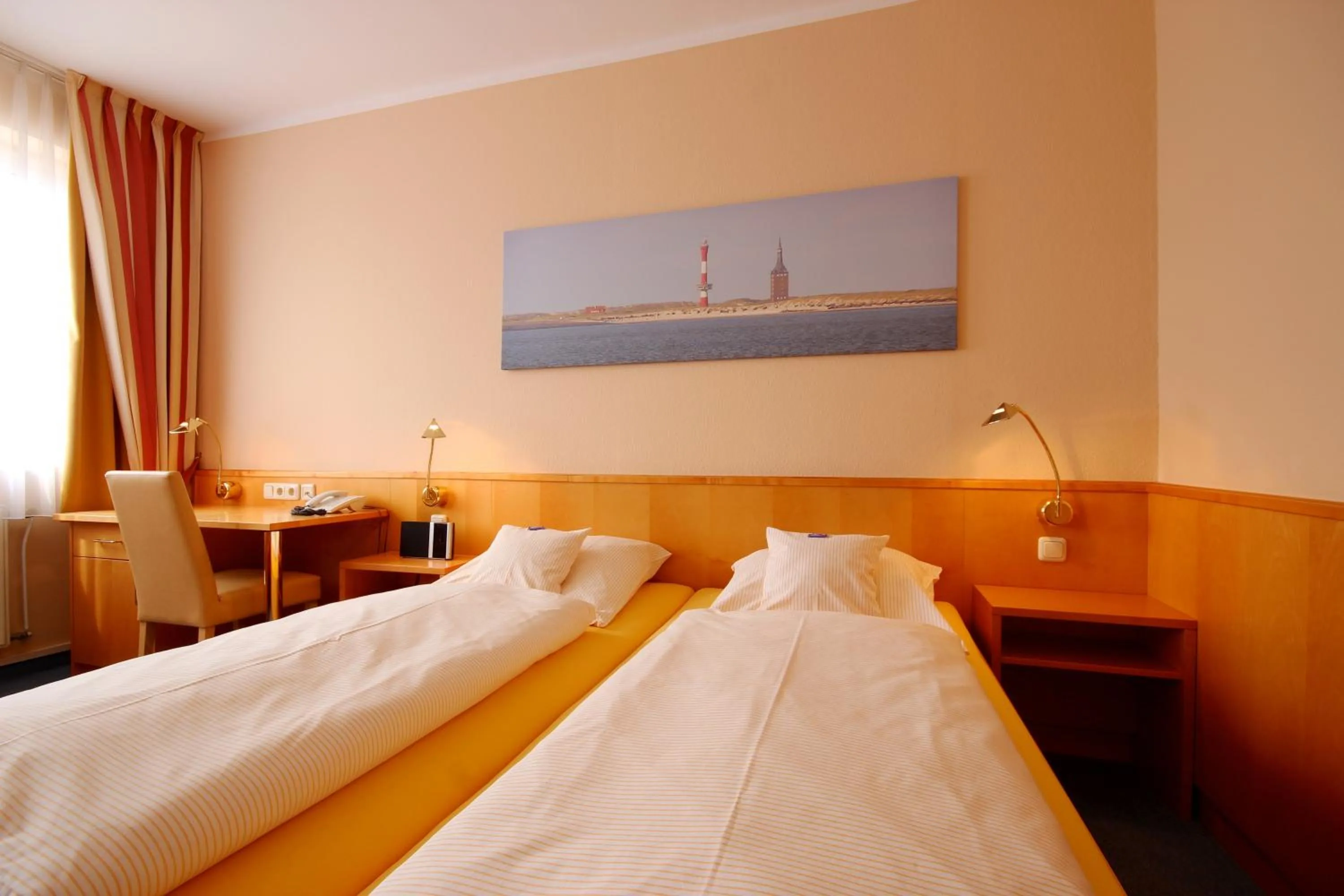 Bed in Hotel Hanken GmbH, Hotel Hanken und Seehotel