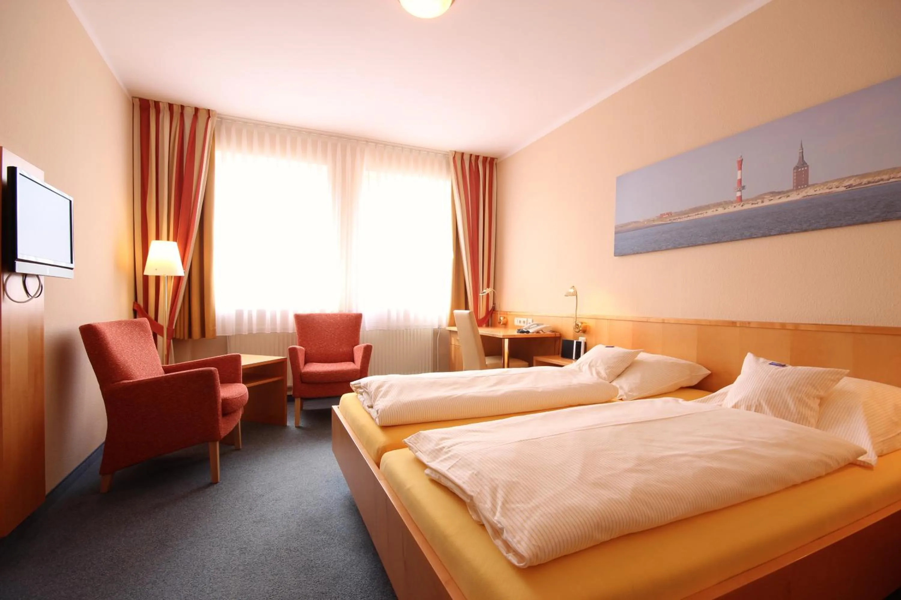 Bed in Hotel Hanken GmbH, Hotel Hanken und Seehotel