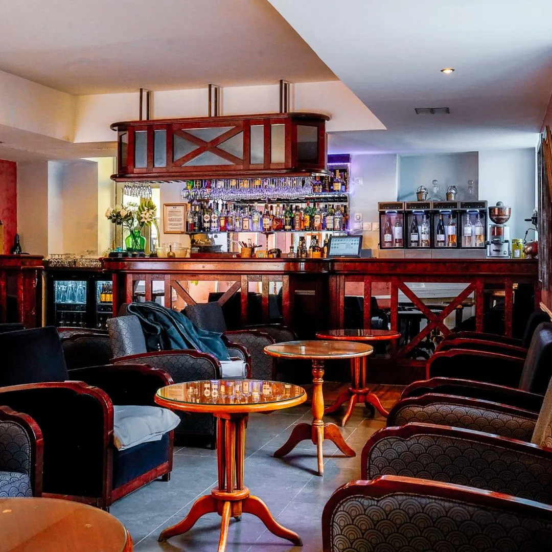 Communal lounge/ TV room in Auberge du Manet