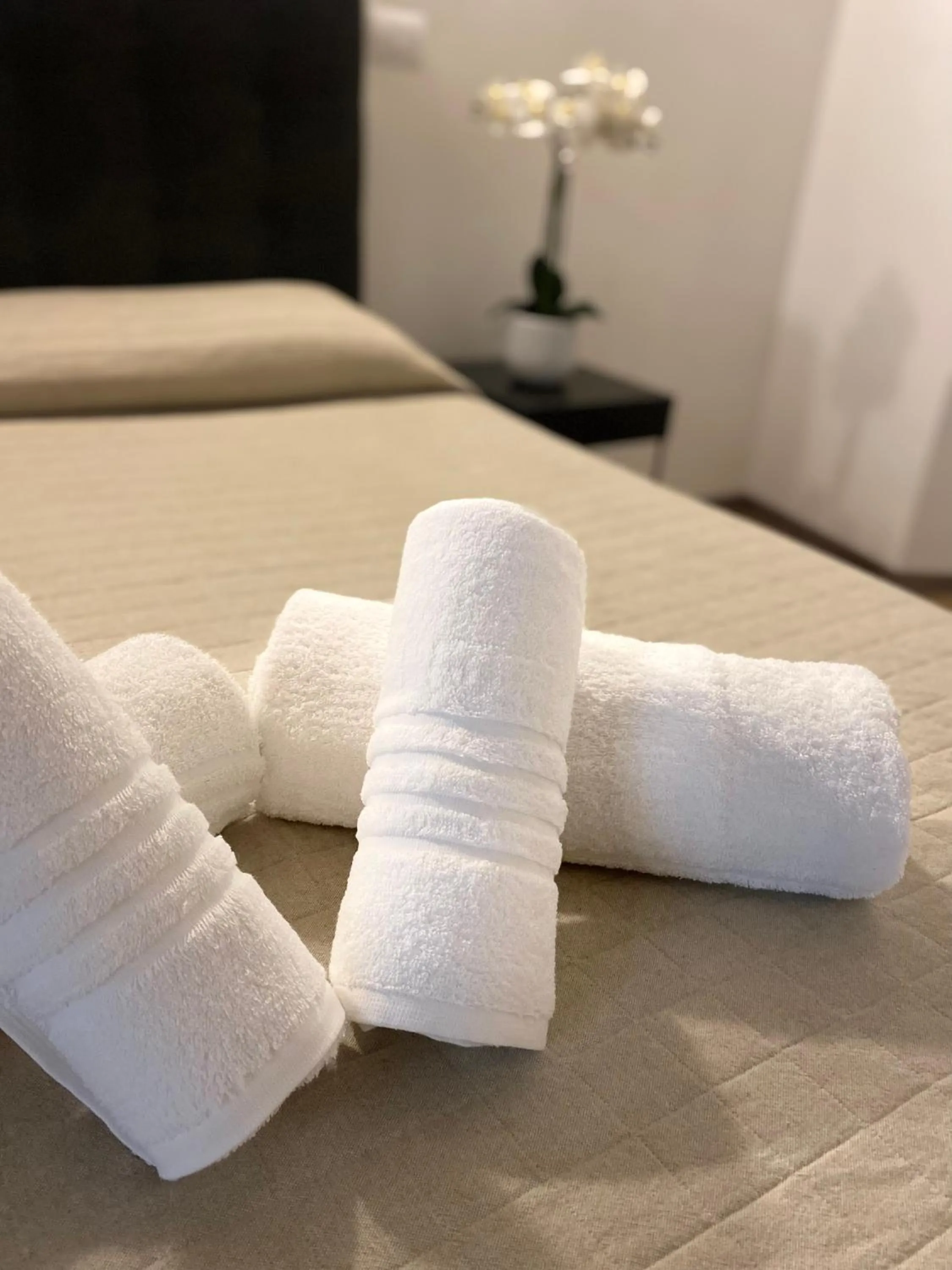 towels, Bed in Palazzo Oliveto