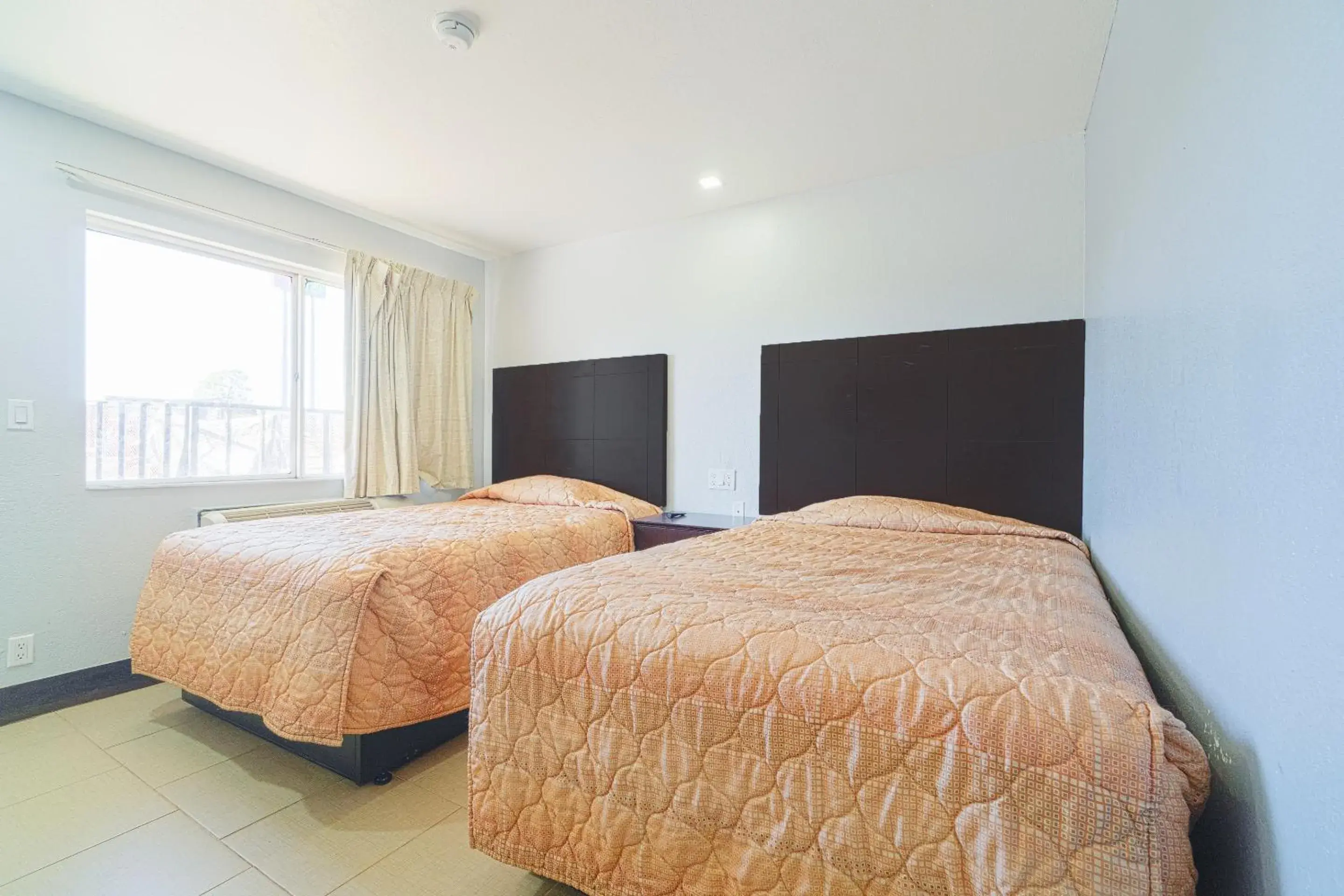 Bedroom in Xpress Inn & Extended Stays Bedroom in Xpress Inn & Extended Stays