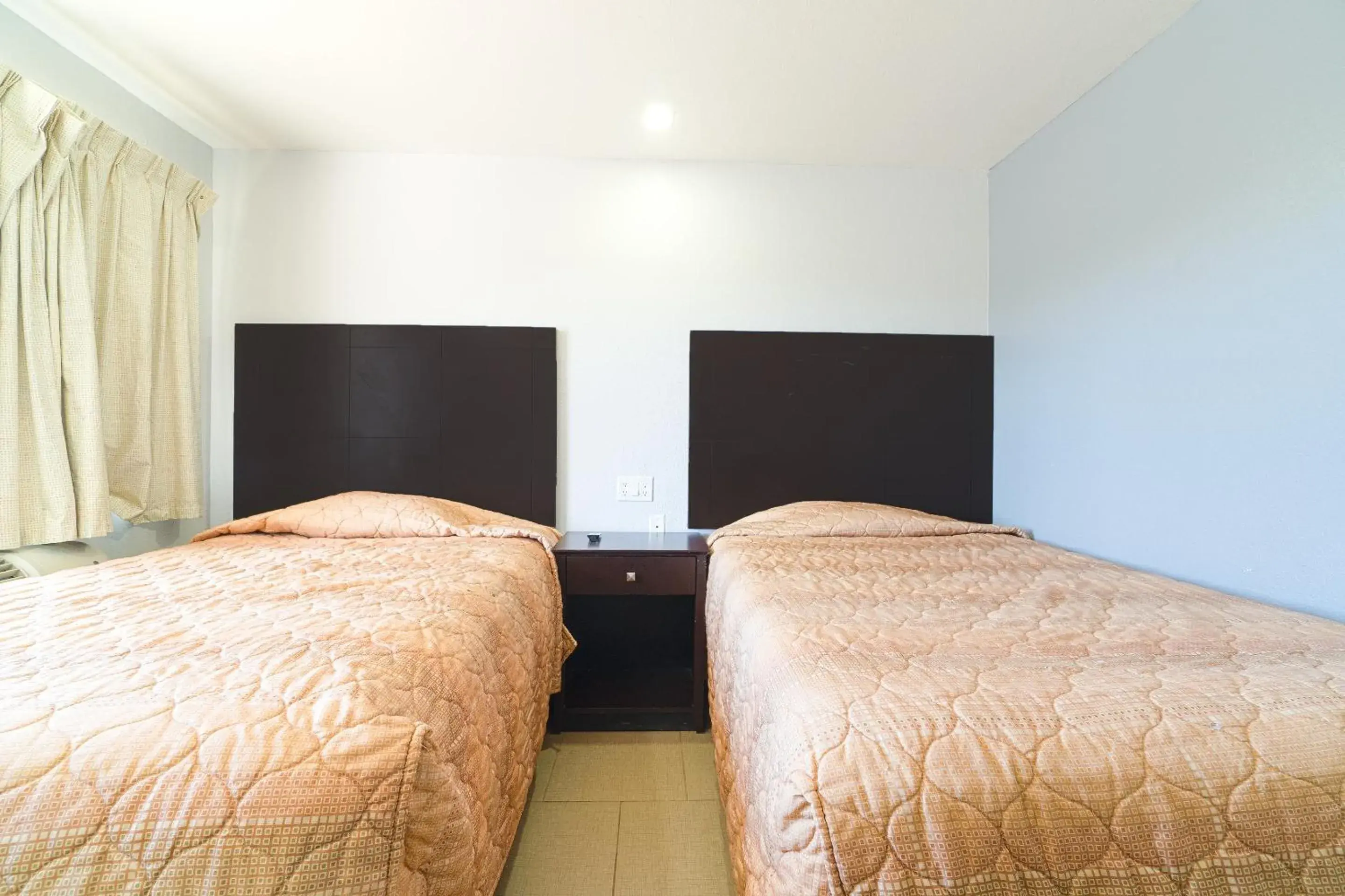 Bedroom in Xpress Inn & Extended Stays Bedroom in Xpress Inn & Extended Stays