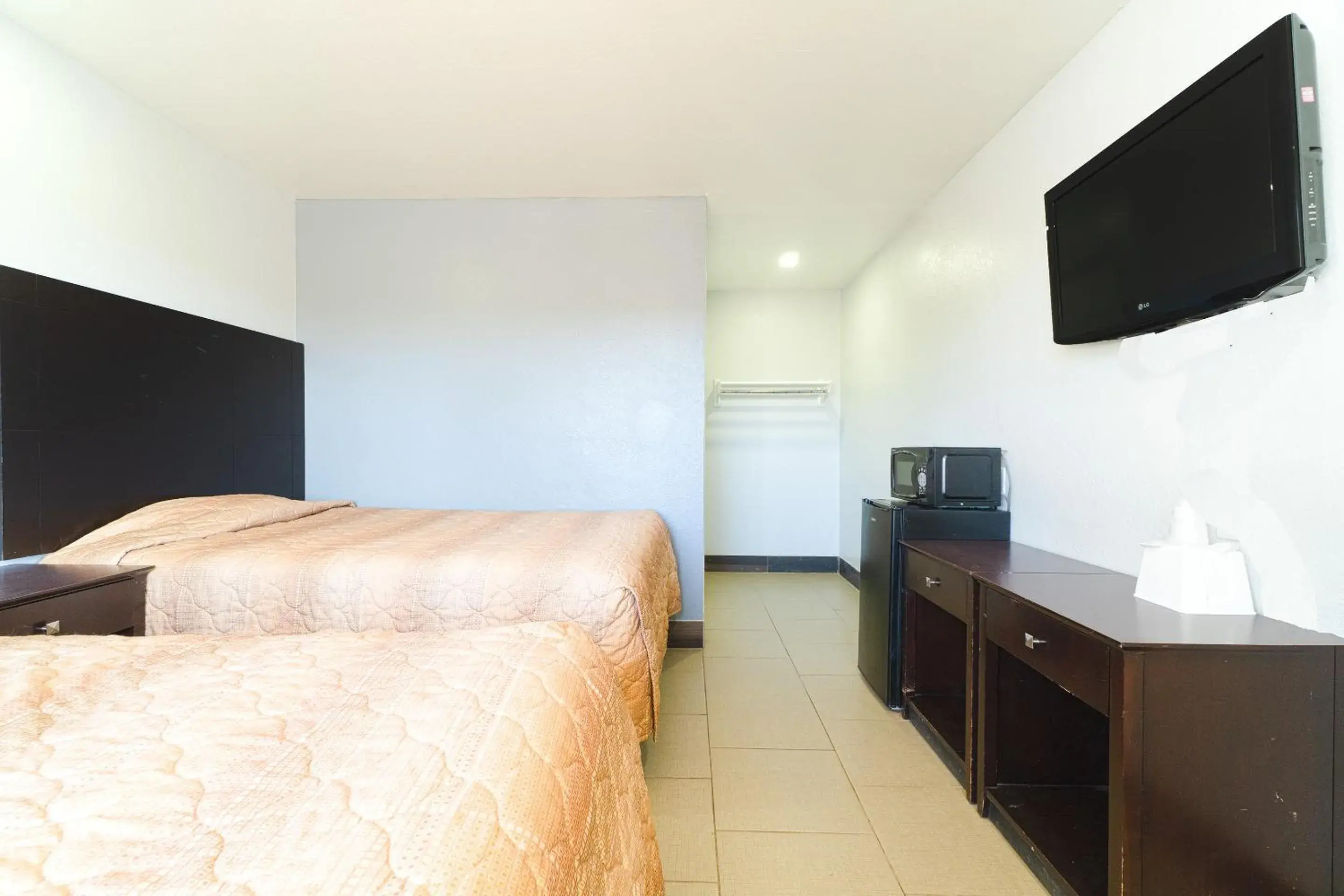 Bedroom in Xpress Inn & Extended Stays Bedroom in Xpress Inn & Extended Stays