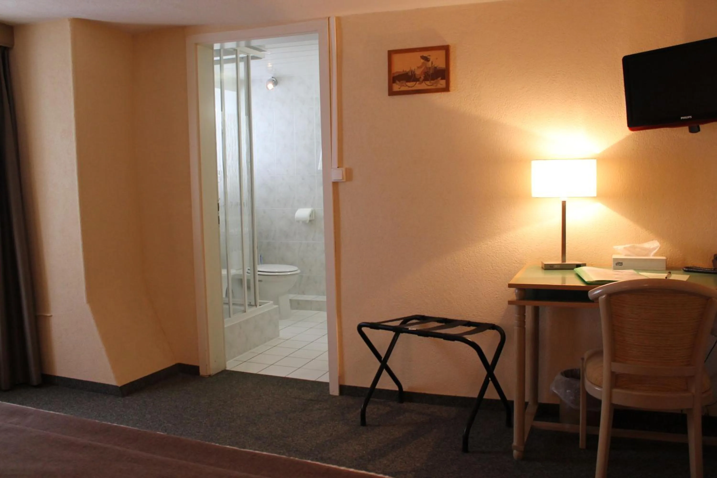 Bed in Auberge des Trois Châteaux