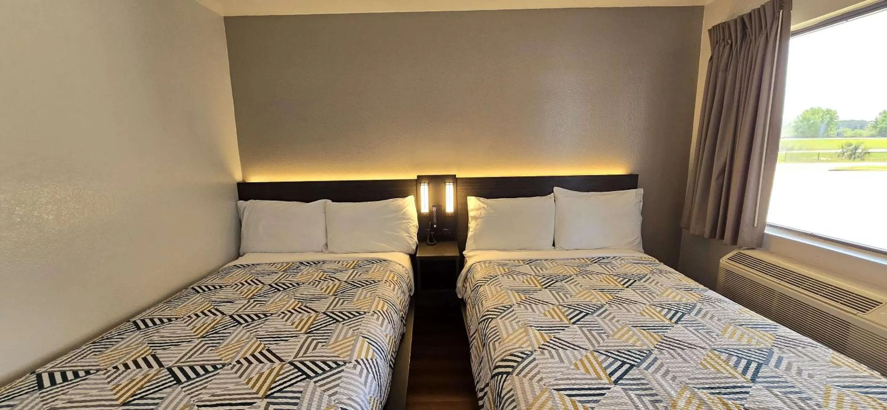 Bed in Motel 6-Slidell, LA - New Orleans